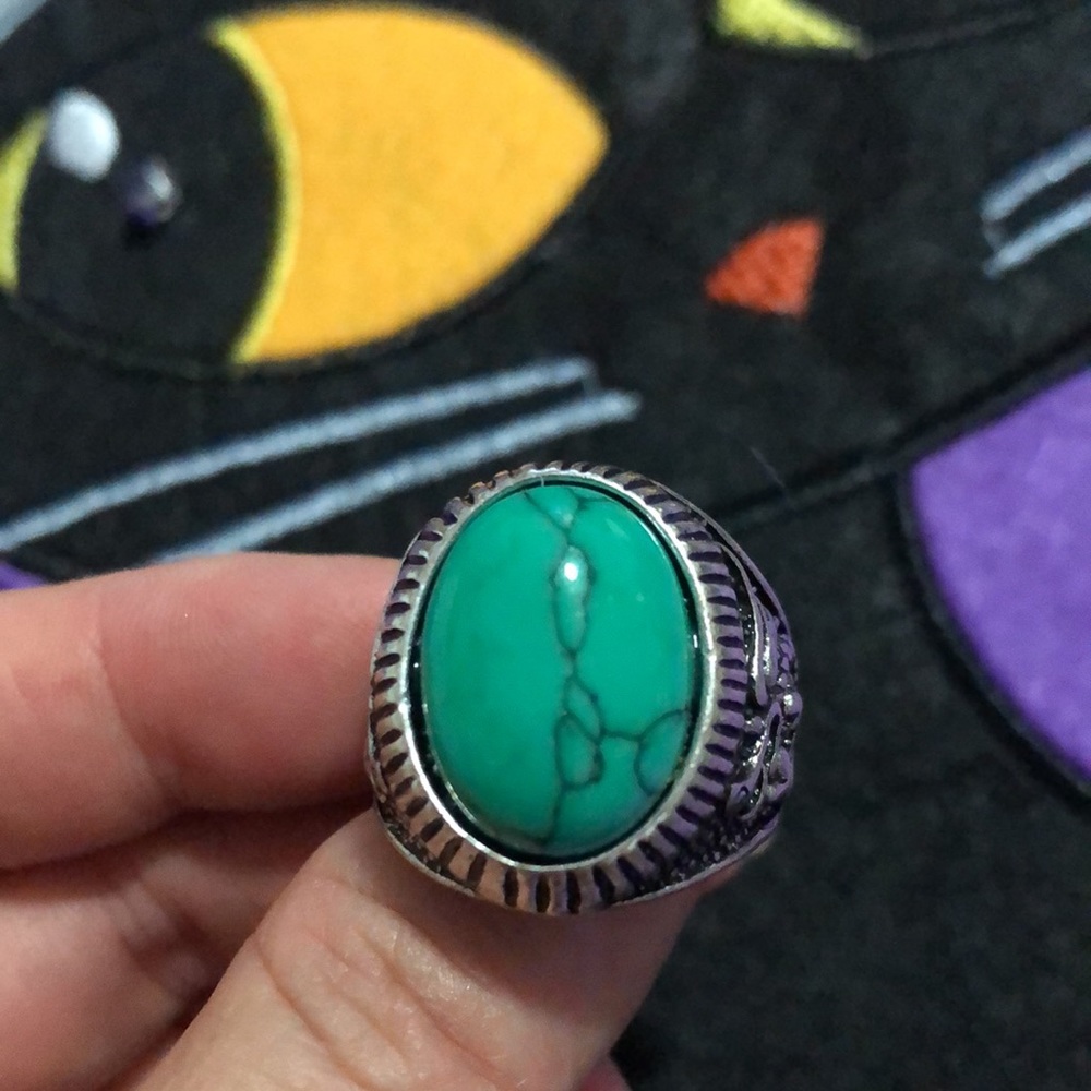 Unique green stone with dragon design ring